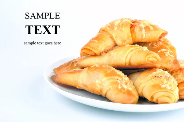 Little croissants with ham and cheese — Stock Photo, Image