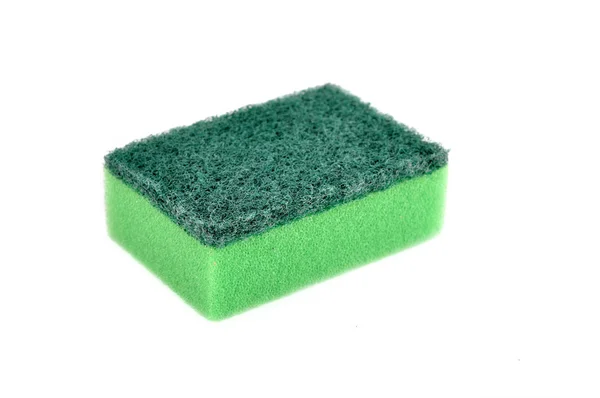 Ένα πράσινο σφουγγάρι πιάτο που απομονώνονται σε λευκό — Φωτογραφία Αρχείου