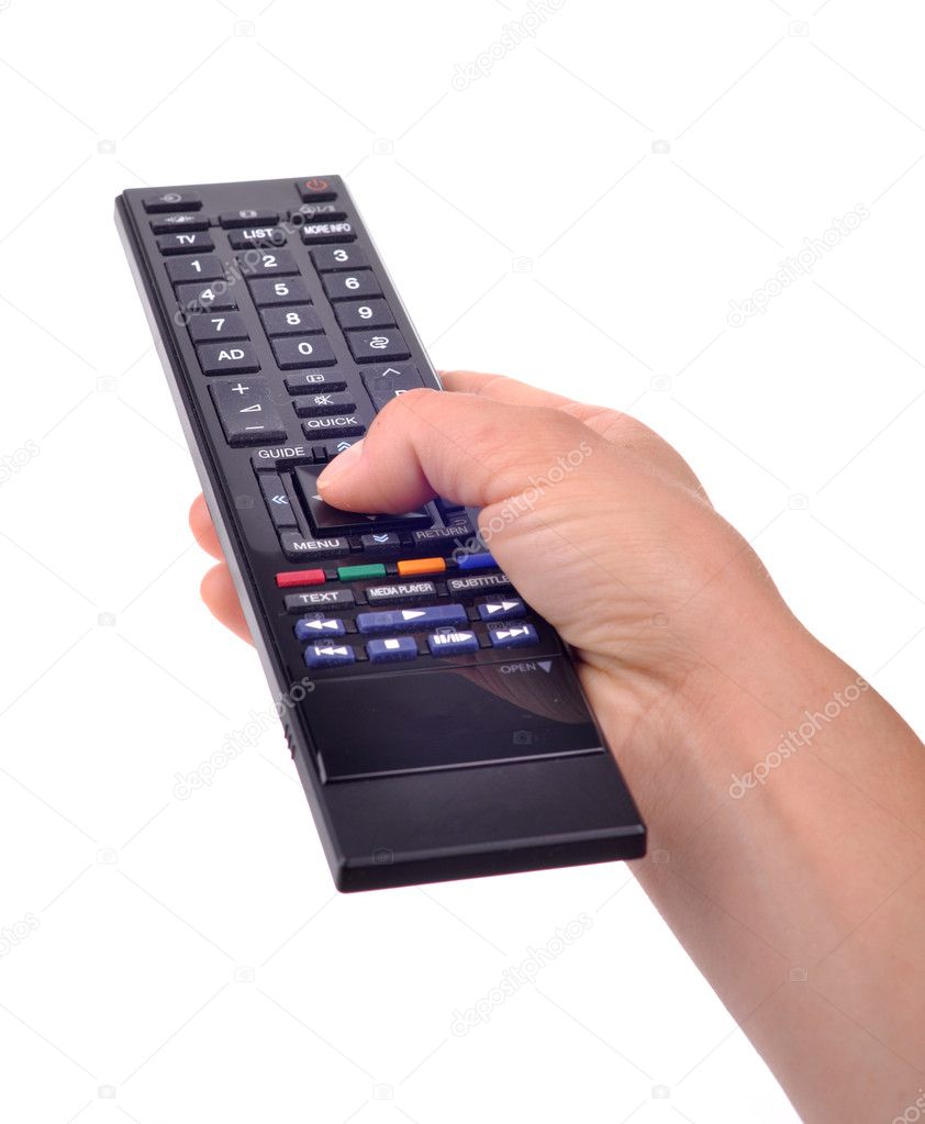 Hand with remote control on white