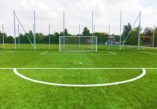 Campo de futebol com portões de gol — Fotografia de Stock