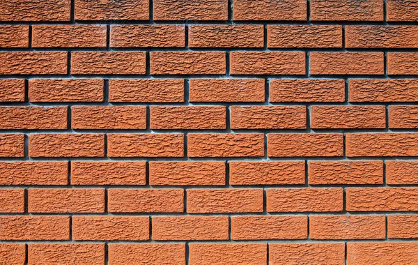 Oranje bakstenen muur textuur Rechtenvrije Stockfoto's