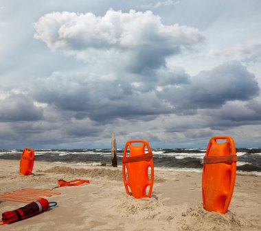 Lifeguard equipment on the beach clipart