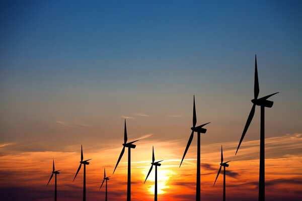 Wind turbines at sunset