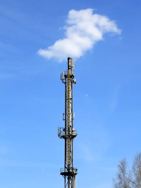 Industrial chimney with antenna — Stock fotografie