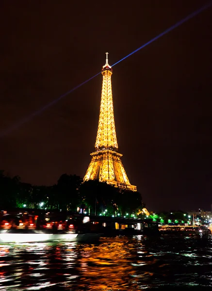 The Eiffel tower lit up in color of French flag, Paris, France. – Stock ...