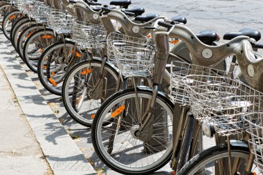 Group of bicycles in the row clipart