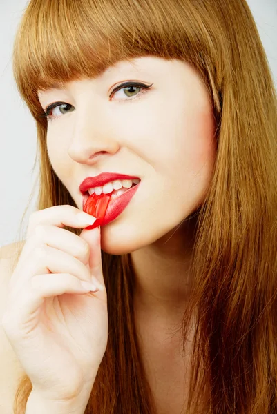 Woman with a candy — Stock Photo, Image