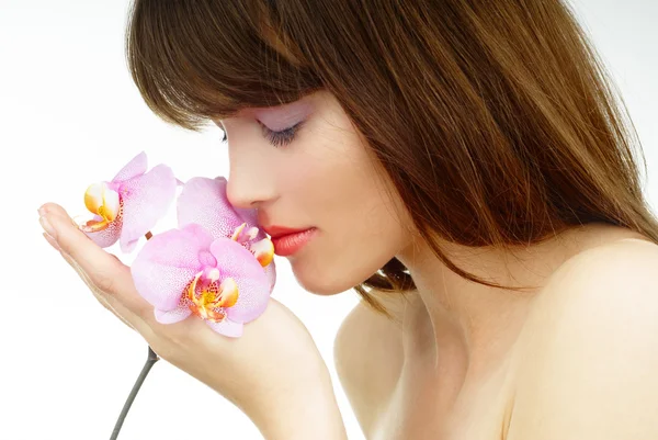 Mujer y orquídea — Foto de Stock