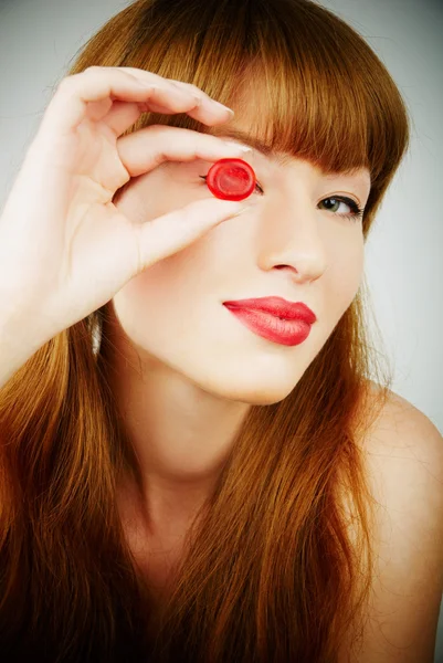 Sexy woman with a candy — Stock Photo, Image