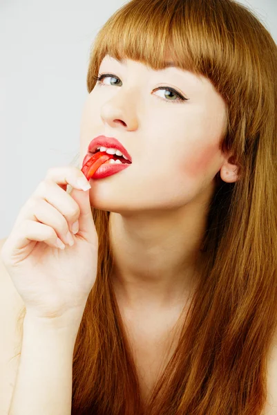 Sexy woman with a candy — Stock Photo, Image
