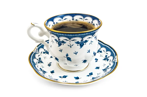 Кава в порцеляновій чашці з синім візерунком — стокове фото