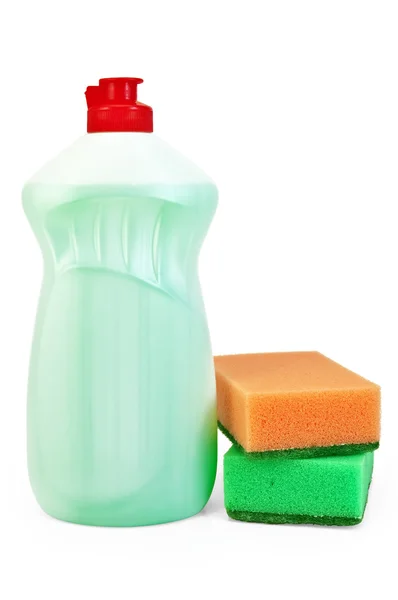 Bottle of detergent and sponges — Stock Photo, Image