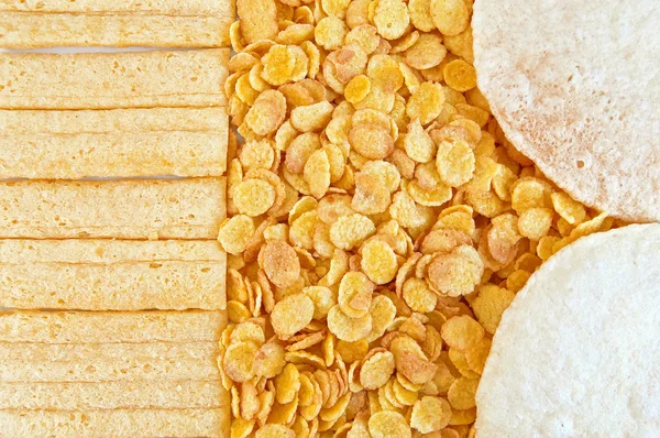 Corn flakes with loaves — Stock Photo, Image