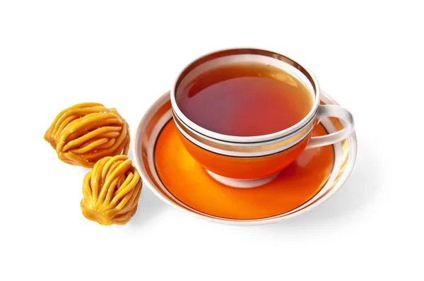 Tea in an orange cup — Stock Photo, Image