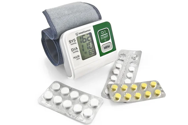 Tonometer with pills — Stock Photo, Image