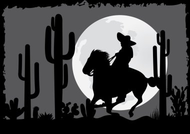 Horseman rides in the desert clipart