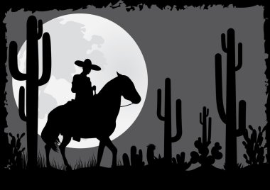 Horseman rides in the desert clipart