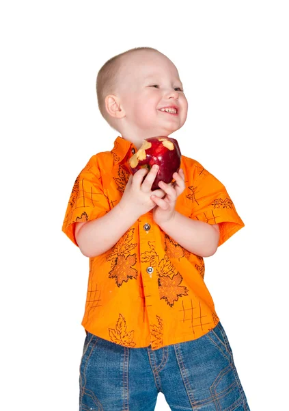 Gutten med et eple. – stockfoto
