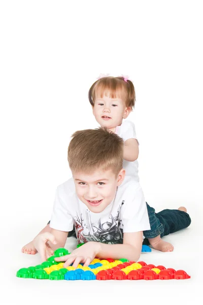 The brother and the sister play — Stock Photo, Image
