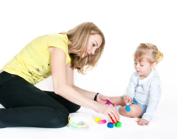 Mother and the daughter mold plasticine — Stock Photo, Image