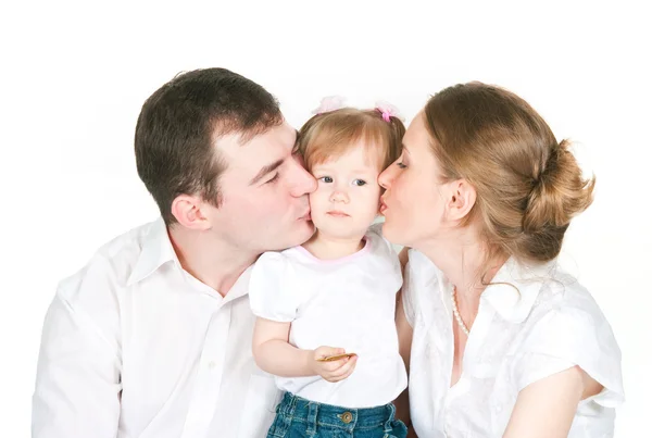 Parents kiss the daughter — Stock Photo, Image