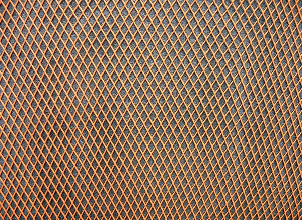 Abstract orange grid surface, closeup plastic background. — Stock Photo, Image
