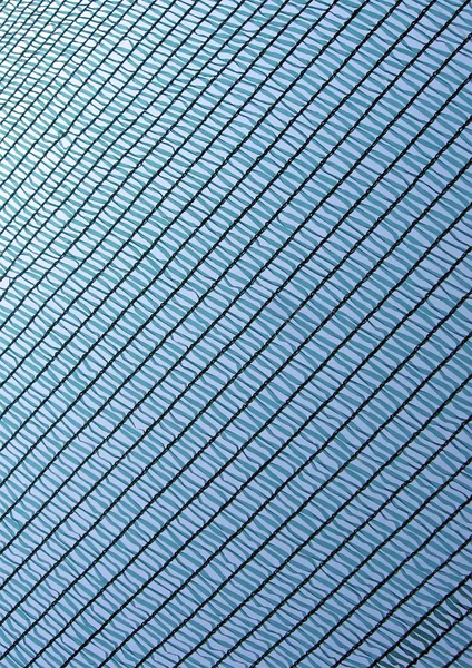 Griglia blu textiled sfondo, primo piano dettagli texture . — Foto Stock