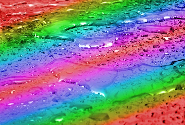 抽象的な虹水滴が表面、天気予報の詳細. — ストック写真