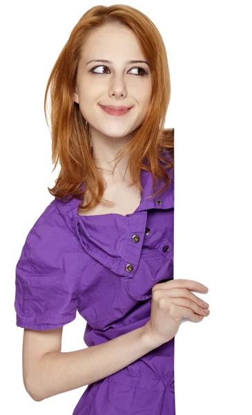 Girl in violet looking from corner — Stock Photo, Image