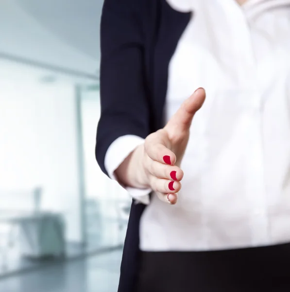 Business woman smiling and hold hand for handshake. — Stock Photo, Image