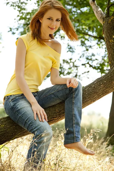 Redhead girl at summer park. — Stock Photo, Image