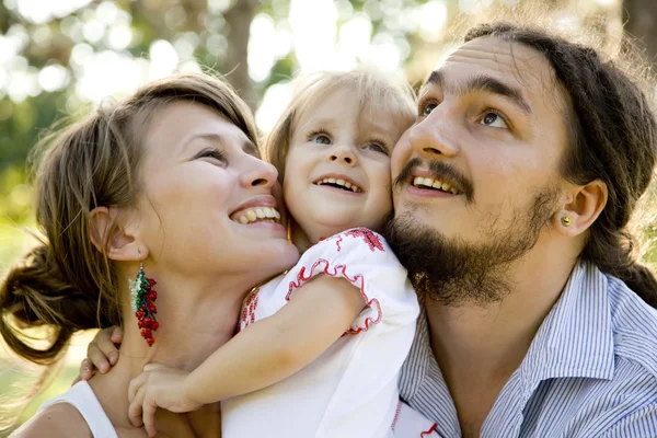 Happy family in summer park — Stock Photo, Image
