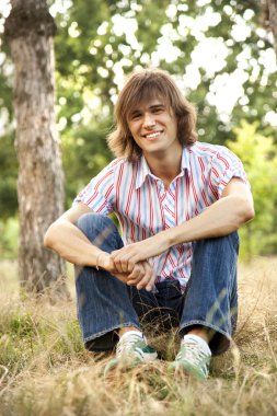 Smiling handsome man at outdoors