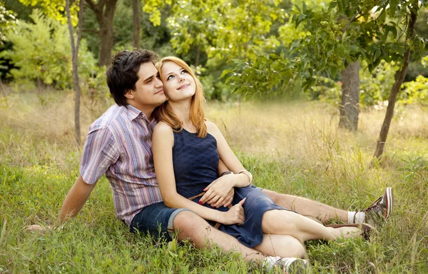 Young couple in love kissing outdoors. — Stock Photo, Image