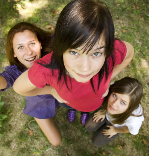 Three girlfriends at the park. — Stock Photo, Image