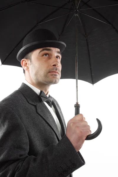 Hombre con un paraguas —  Fotos de Stock