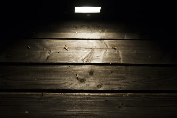 Halogen on wooden wall — Stock Photo, Image