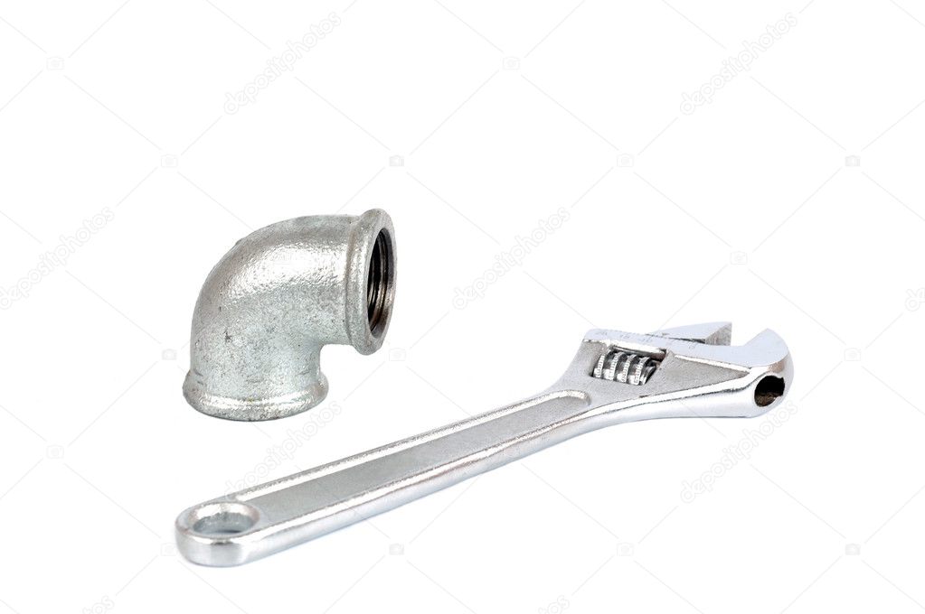 Adjustable wrench tool and malleable elbow 90 degrees on the white bac