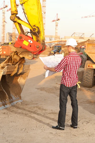 stock image Architect working outdoors on a construction