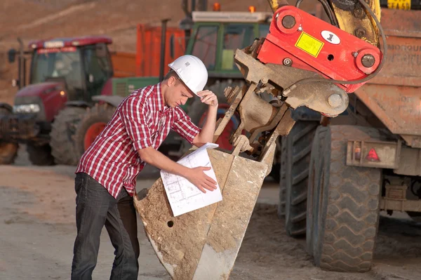 Stock image Architect working outdoors on a construction