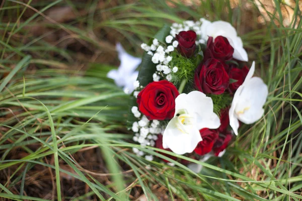 stock image Bridal bouquet in the grass