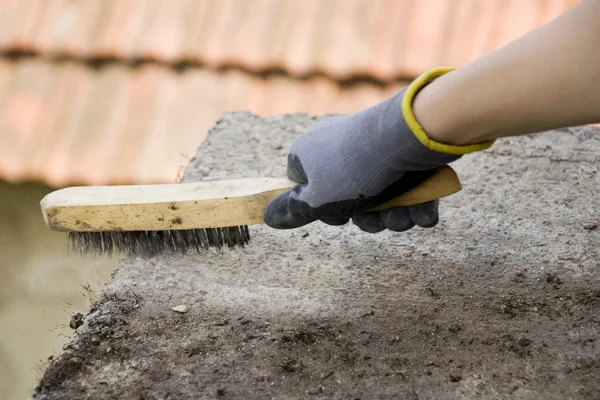 stock image Close-up of woman's hand holding a brush