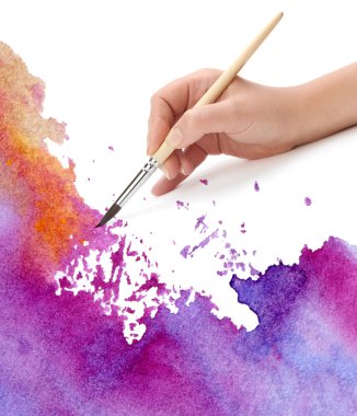 Hand with brush and watercolor paint clipart