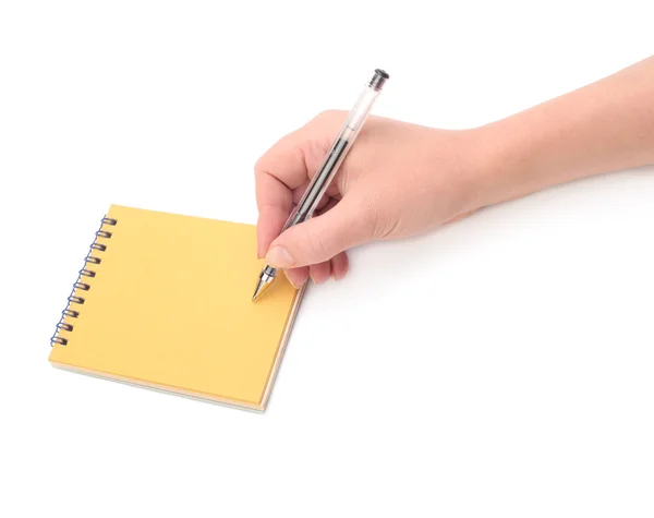 Ręka z notatnik i długopis — Zdjęcie stockowe