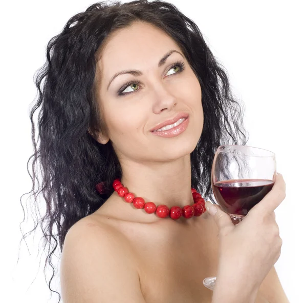 Piękna kobieta z kieliszkiem czerwonego wina — Zdjęcie stockowe
