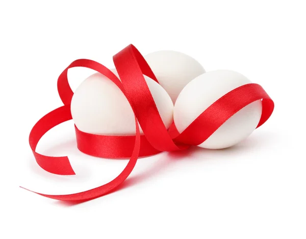 Eggs with ribbons — Stock Photo, Image