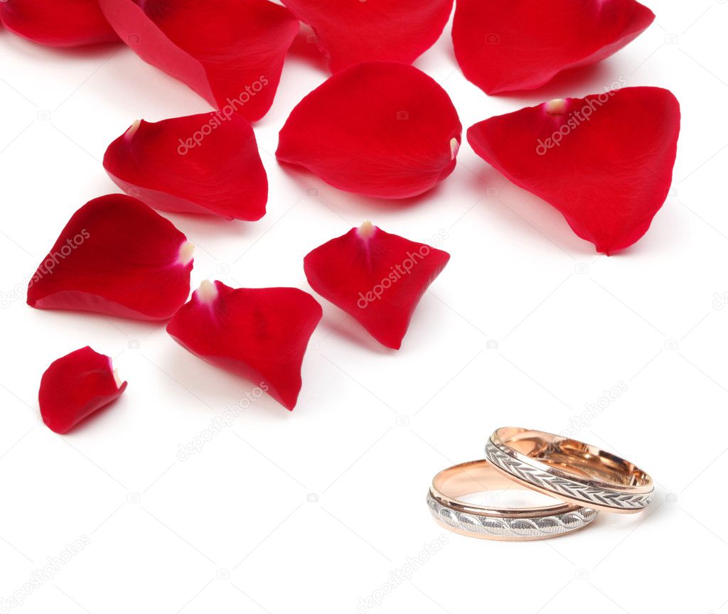 Wedding rings and rose petals Stock Photo by ©Tihon6 6193773