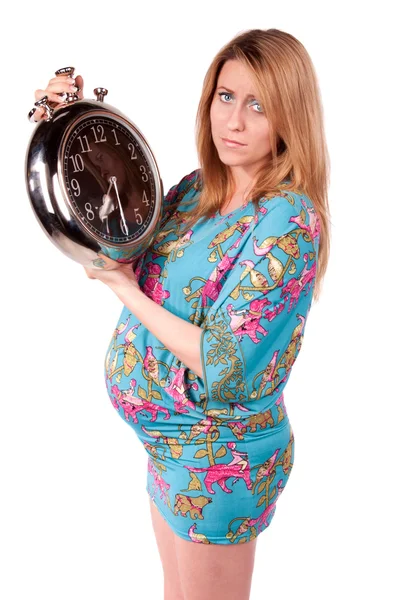 Portrait of sad beautiful pregnant woman with clock — Stock Photo, Image