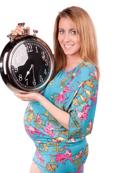 Portrait of happy beautiful pregnant woman with clock — Stock Photo, Image