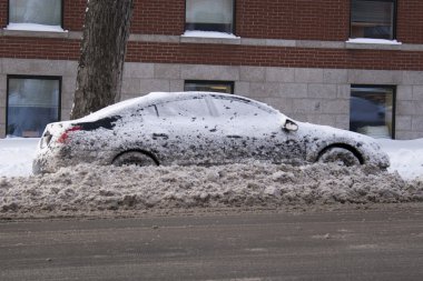 Parked car in snow heavy winter clipart